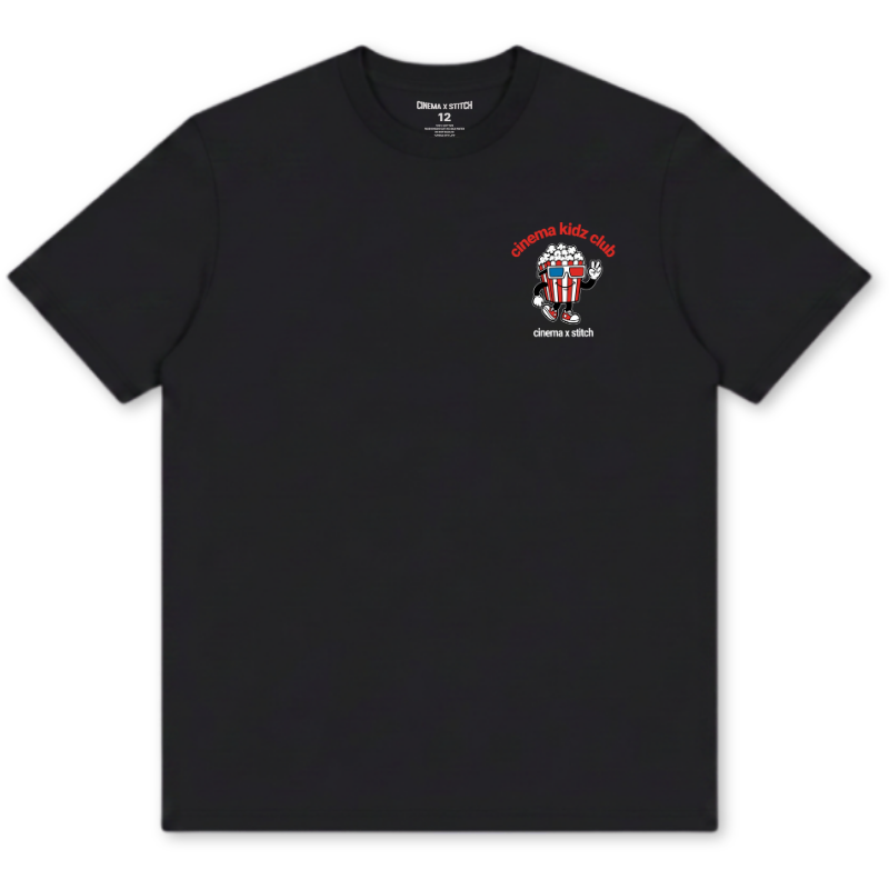 A black short-sleeve crewneck t-shirt with a small graphic on the left chest. The graphic features a red arched text reading 'sanna kids club' above a cartoon character with a red, white, and blue striped hat, with 'sanna kids club' printed below in white.